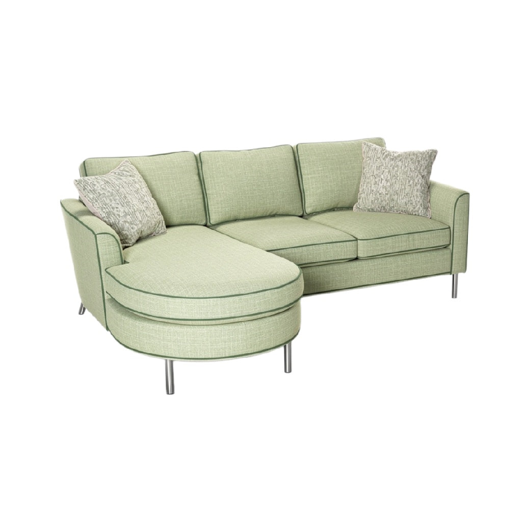 **Zielona sofa narożna z poduszkami**
